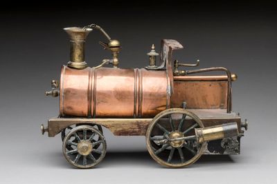 a small model of a steam engine on display