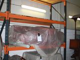 a room with a lot of items on the shelves