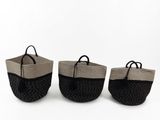 three black and white baskets with handles on a white background