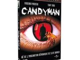 a close up of a dvd on a white background with a red eye