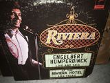 a box with a picture of a man singing into a microphone