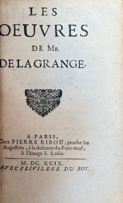 an old book with a picture of a lion on the cover