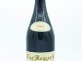 a bottle of wine that is sitting on a table