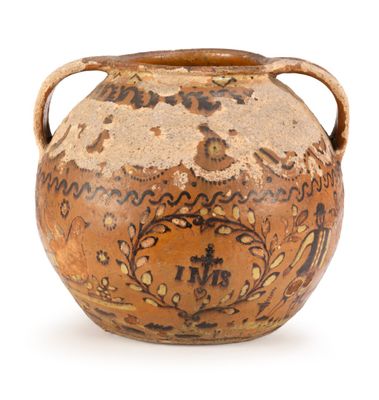 a brown vase with a handle on a white background