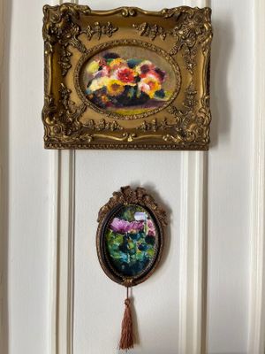 a picture of a painting hanging on the wall