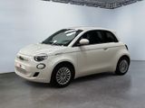 an image of a white smart car in a showroom