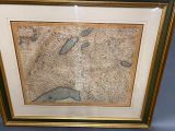 an old map of the united states is displayed in a gold frame