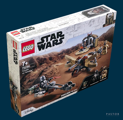 une boîte contenant des sets Lego Star Wars sur fond bleu