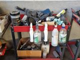 a red cart with tools and other items on it