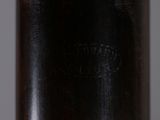 close up of a bottle of wine with a cork stopper on it