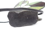 a pair of glasses sitting on top of a rock