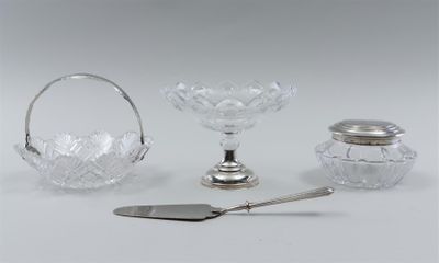 three pieces of glass and silverware including a spoon, a glass bowl, and a silver plate