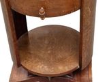 a wooden table with a glass top on a white background