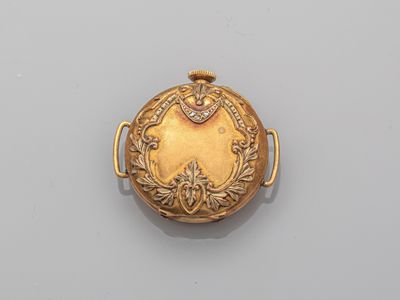 a gold locke with a heart and a flower design on the front