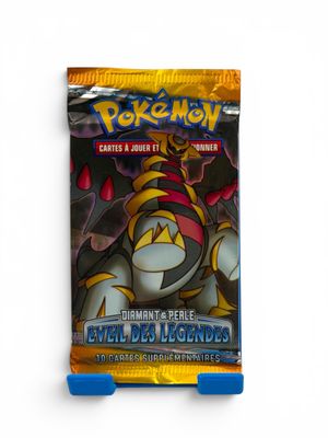 a close up of a bag of pokemon cards on a white surface