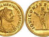 a gold coin with an image of a man holding a sword