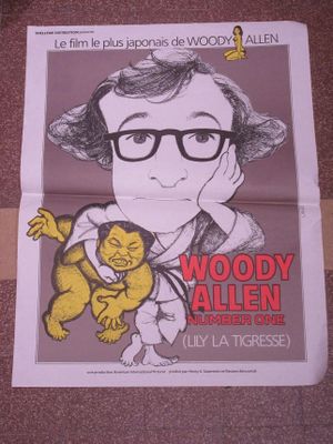 une affiche représentant Woody Allen avec un singe dessus