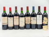 plusieurs bouteilles de vin sont alignées sur une table