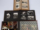 an open book with pictures of people and animals on it