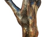 sculpture of a bronze hand on a black marble base