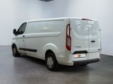 a white van that is parked in a room