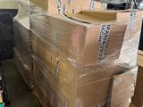 a pile of boxes sitting on a pallet in a warehouse