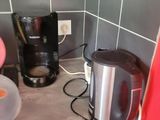 a coffee maker on the counter in the kitchen