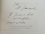 an open book with a handwritten poem on the cover