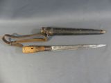 two different types of knives that are on the table