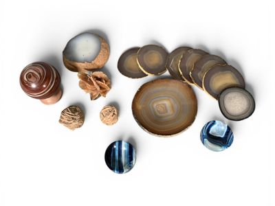 many different types of stones on a white surface