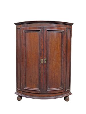 an image of a corner cabinet with two doors