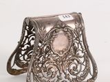 pair of antique silver napkin rings with a pink stone center