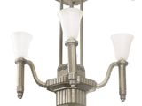 a chandelier with three lights attached to it