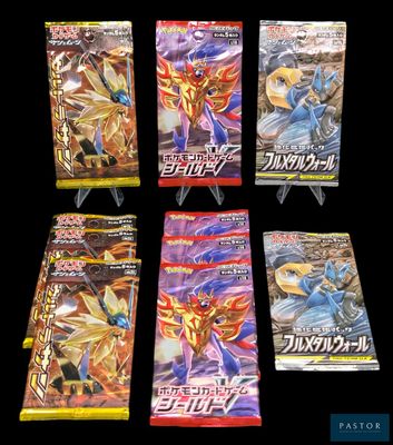 quatre paquets de cartes à collectionner Pokémon sur fond noir