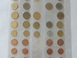 a lot of coins in a plastic bag on a table