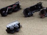 a lot of toy cars that are on the floor
