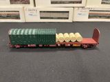 a toy train that has rolls of toilet paper on it