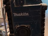 a picture of a makita machine in a garage