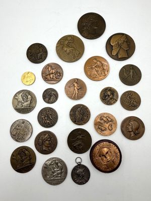 a close up of a bunch of coins sitting on top of a table