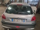 a silver car that is parked in a garage