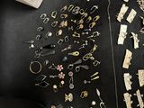 a table with a bunch of jewelry on it