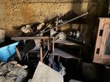 an image of a cluttered room with a lot of junk