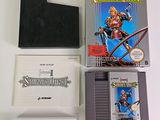 a nintendo game on the table next to a game case