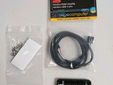 a cable and a remote control sitting on a table