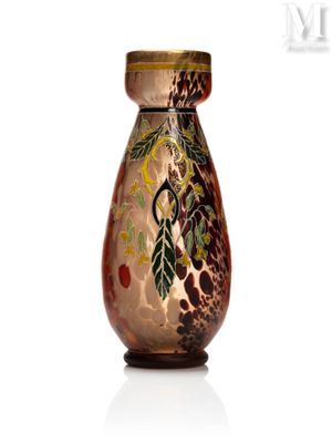 a glass vase with a design on it on a white surface