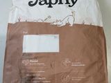 a bag of dog food sitting on a table