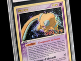 a close up of a pokemon trading card in a plastic case