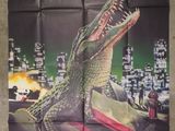a movie poster for the film crocodile, starring crocodiles and crocodiles