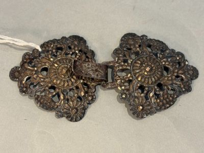 pair of antique silver metal filigree earrings with filigree details