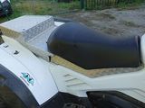 a white motorcycle with a box on the back of it